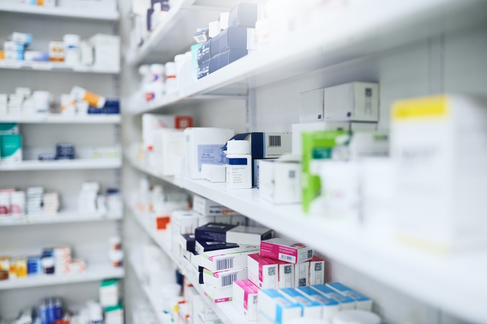 Pharmacy, medicine and box with healthcare store, shelf and prescription care pills. Medical, retail shop and supply of health supplements, vitamins and minerals for vitality and wellness dispensary