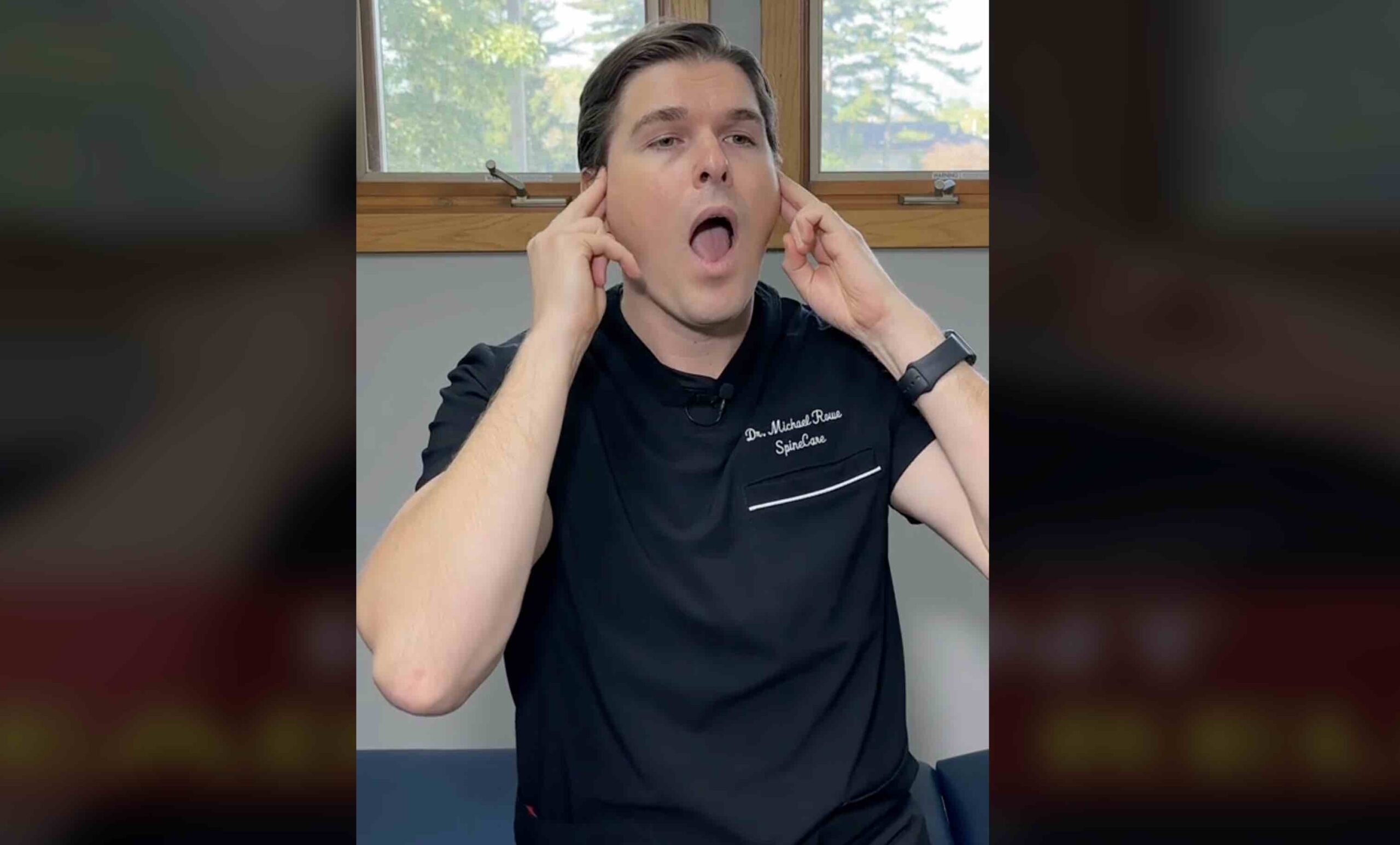 Dr. Michel Rowe on TikTok demonstrating how to technique to relieve a headache