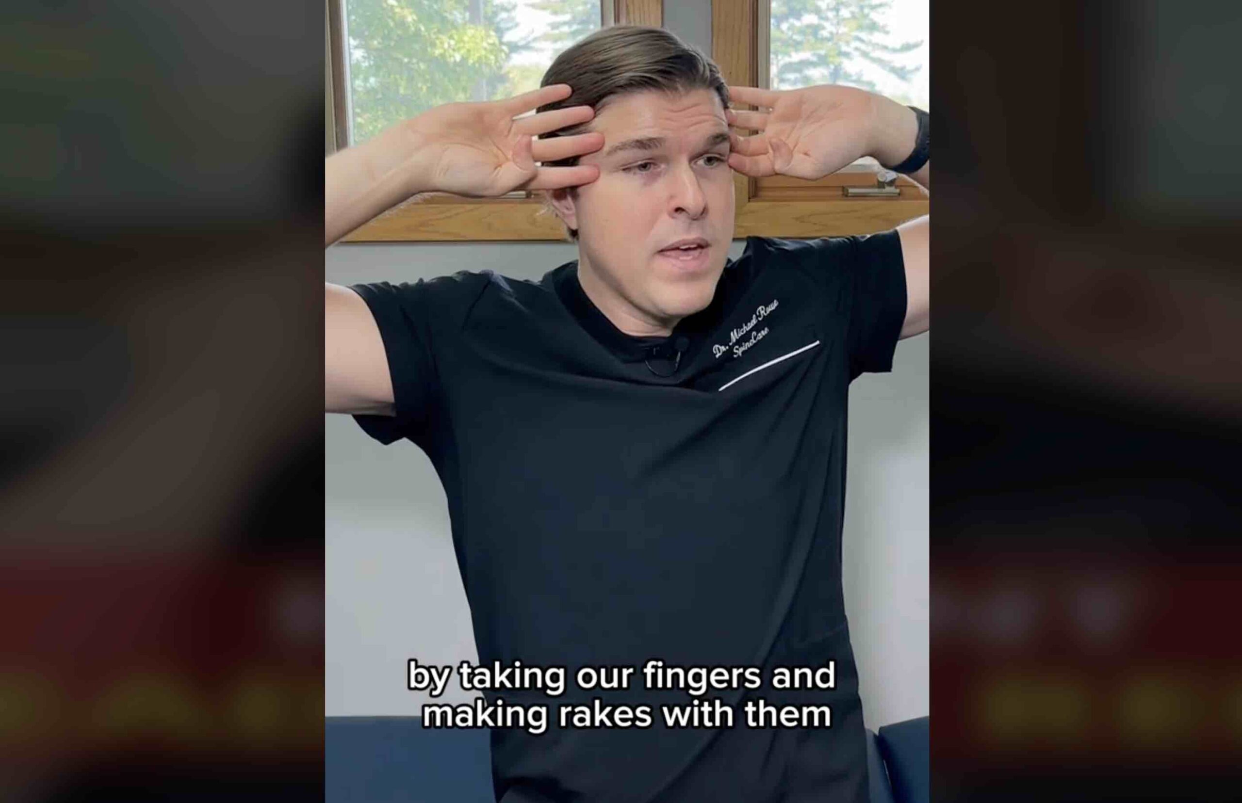 Dr. Michel Rowe on TikTok demonstrating how to technique to relieve a headache