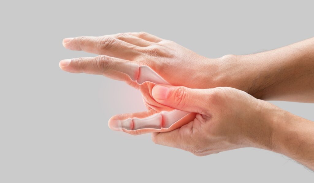 A man has a sore palm because of inflammation of the finger bone.