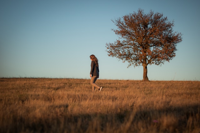 woman beside a tree