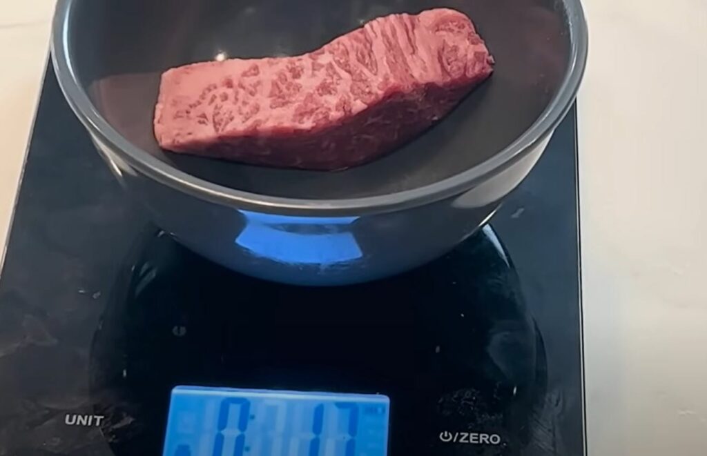 A cut of beef in a scale.
