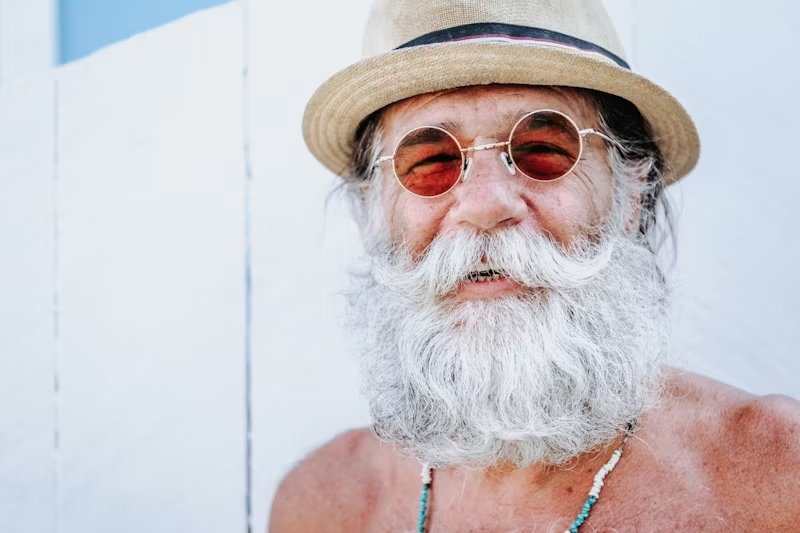 gentleman with a beard smiling