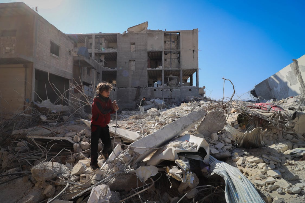 Boy Standing on Ruins