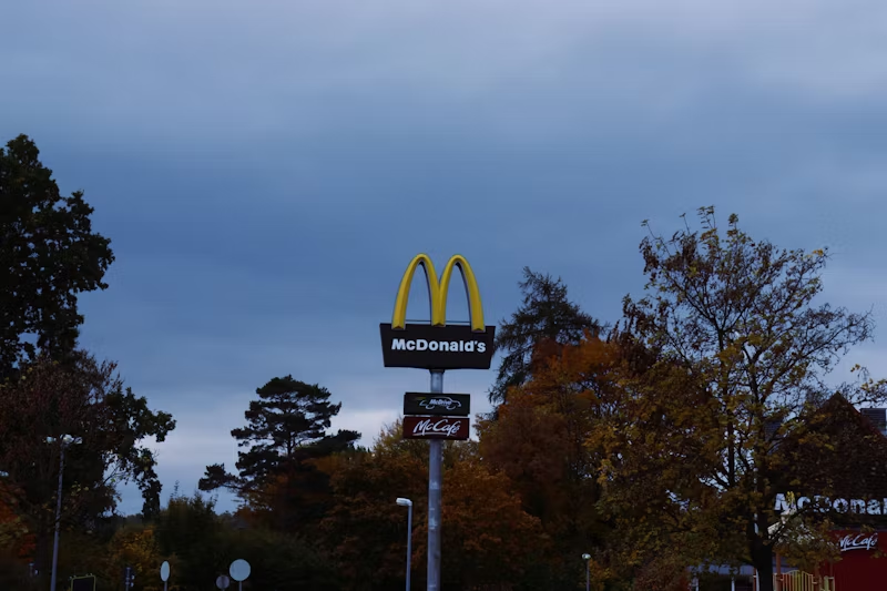 McDonalds Sign amongst trees