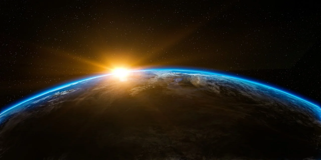 sunlight cresting the curvature of the Earth
