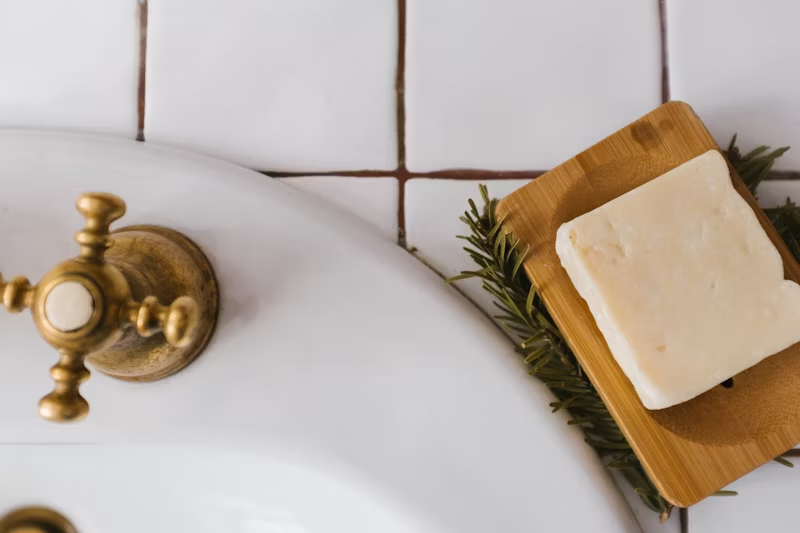 bar of soap beside a sink