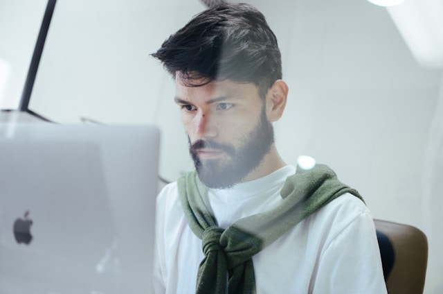 man working on a laptop 