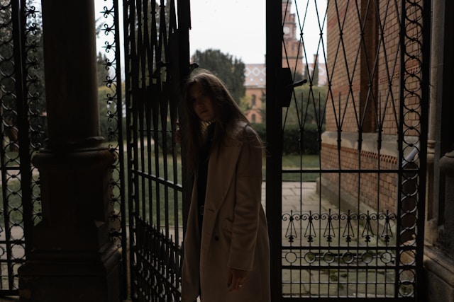 woman by a gate 