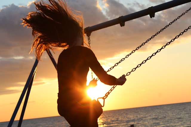 a woman on a swing 