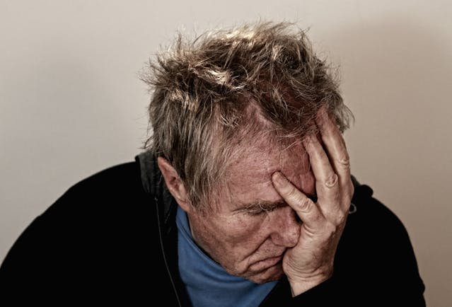 man with headache