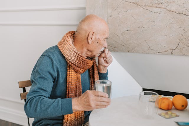 old man coughing