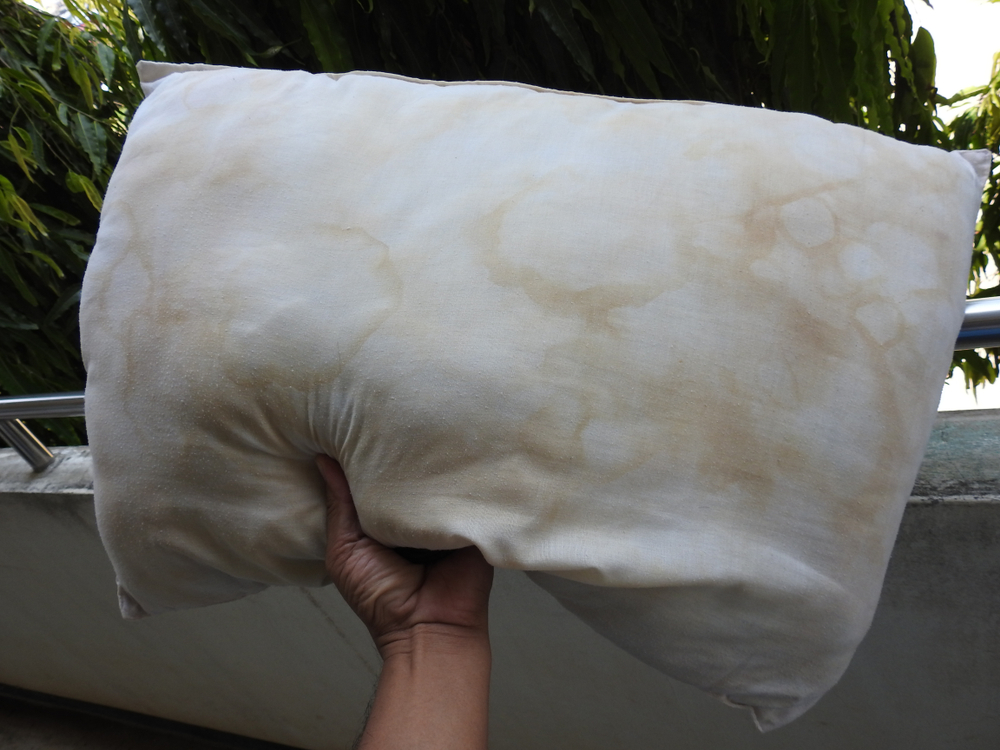 Stains of saliva and sweat on white pillows
