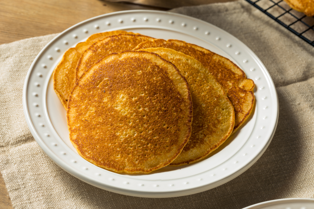 Homemade Corn Meal Johnny Cakes with Butter and Syrup
