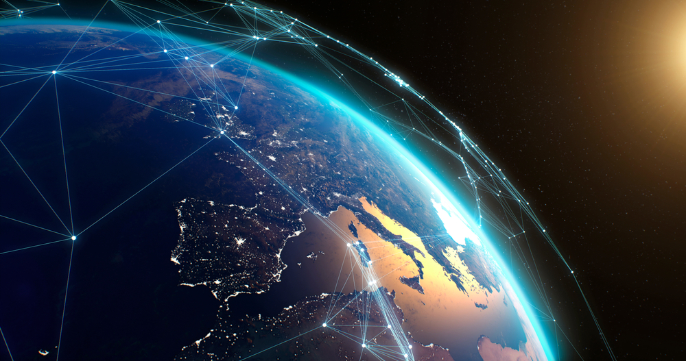 Pan left view of digital connections among satellites above surface of Earth from space