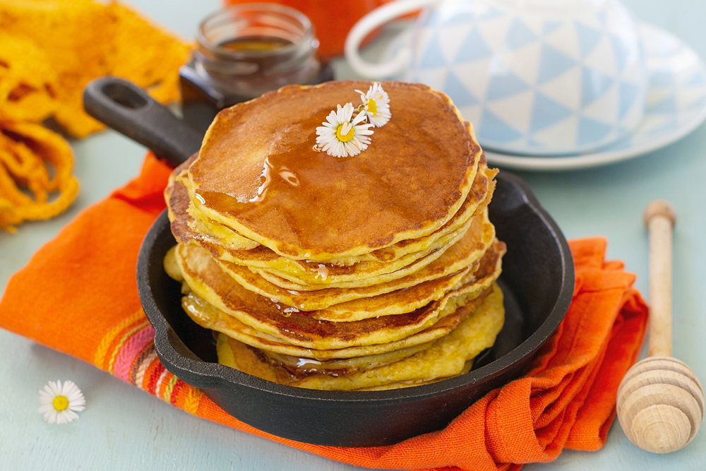 Traditional Southern Hoe Cakes (Johnny cakes) served with honey
