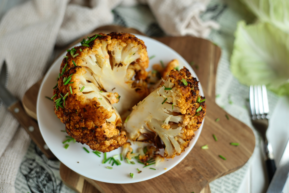 Baked cauliflower with turmeric. Delicious cauliflower. The perfect tasty snack. It tastes delicious with meat.