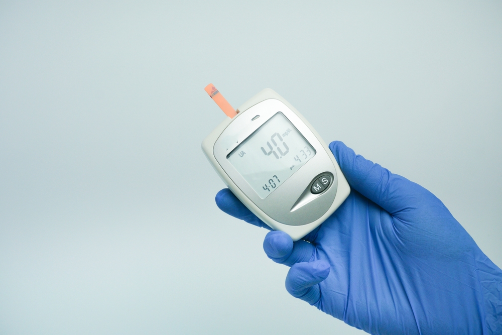 medical device to check uric acid, blood sugar and cholesterol. The uric acid content in the blood is within normal limits
