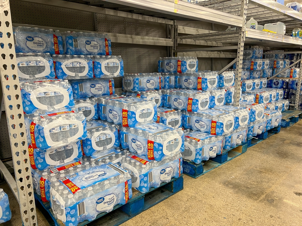 Norfolk, NE USA - May 12, 2023: A display of cases of Great Value bottled water at a Walmart Store with no people.