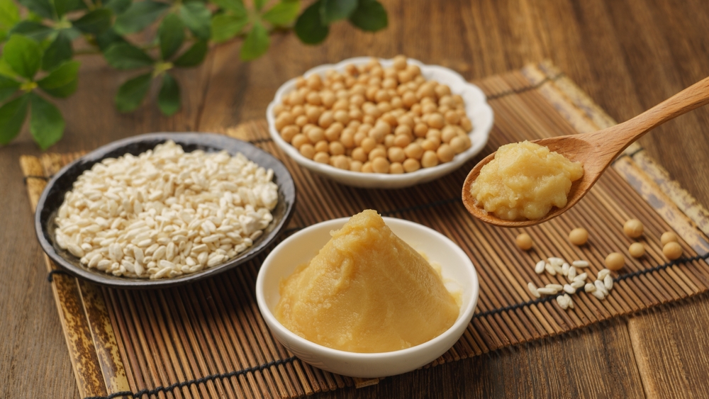 Miso is a Japanese fermented seasoning.Ingredients soybeans and rice koji.Image of white miso and Saikyo miso.
