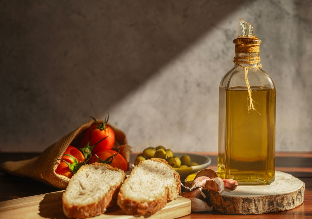 Typical Mediterranean breakfast, olive oil, tomato, garlic and bread. Healthy lifestyle
