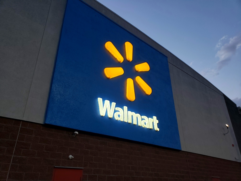 Walmart Supercenter - Walmart Logo on store front glows in the night (Cheyenne, Wyoming, USA) - 07\29\2024