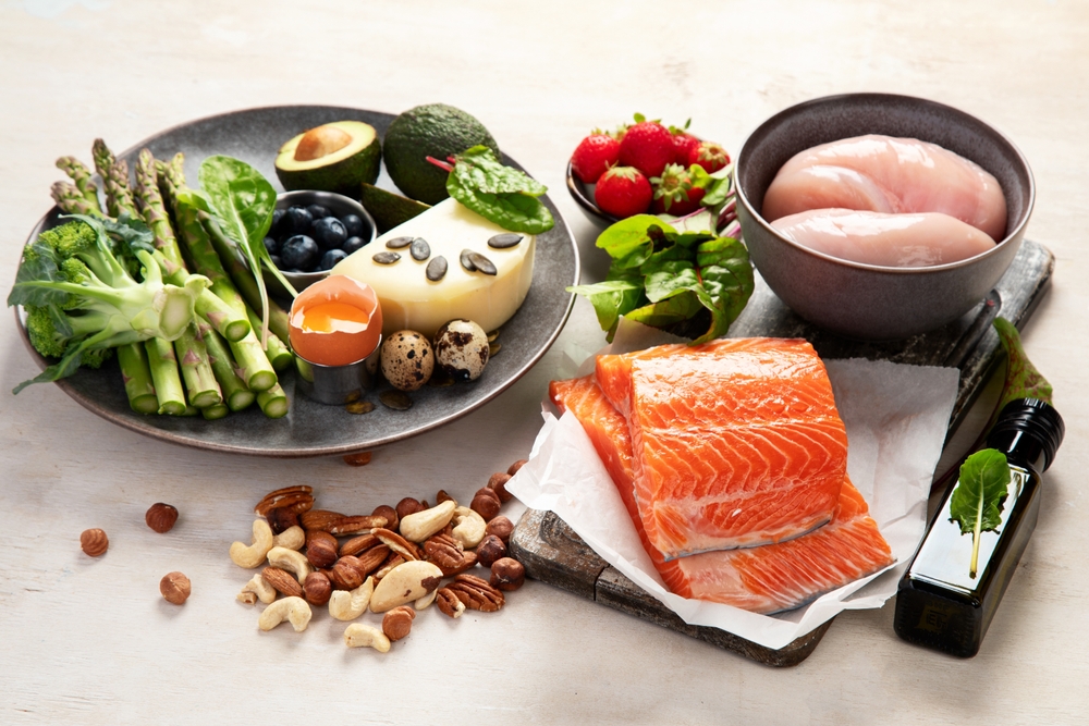 Healthy low carbs products. Ketogenic diet concept on a white background. Top view.