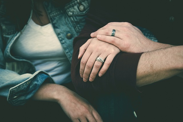 couple joined by arms