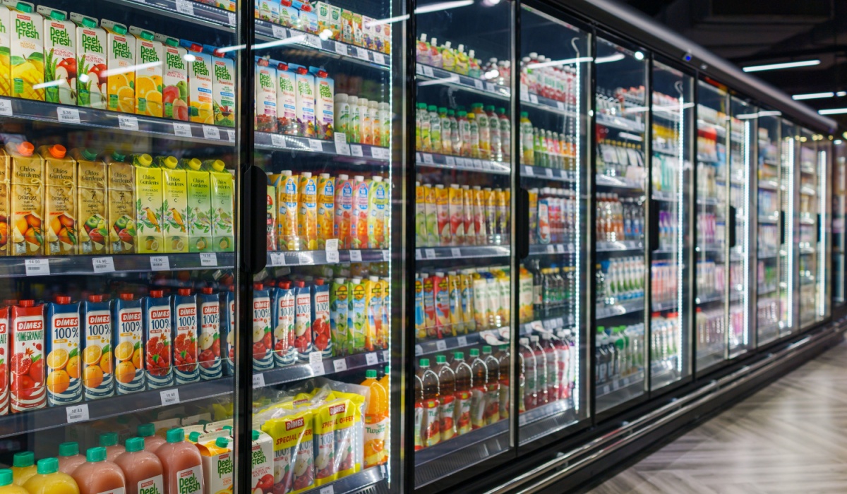 Interior view of huge glass fridge with various brand fruits juice in Mercato grocery store. Mercato is the coolest fresh premium supermarket in Malaysia.