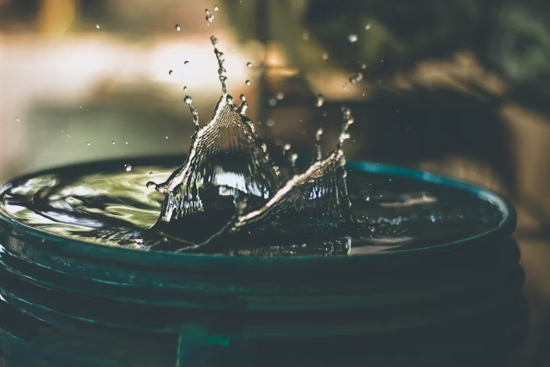 water splashing in a barrel