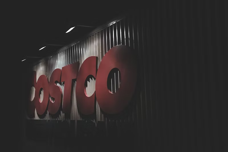 Costco sign at night under lights