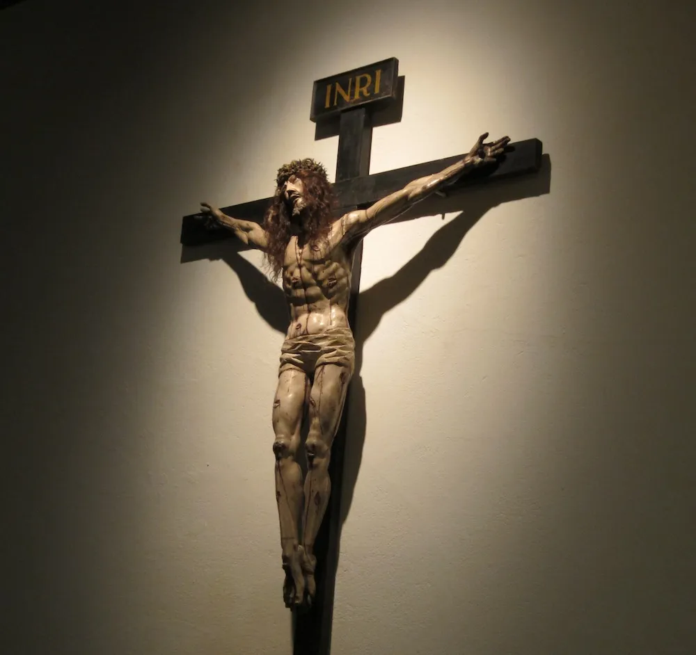 A statue of Jesus on the cross at the Cathedral Basilica of Saint Francis in Santa Fe, NM.