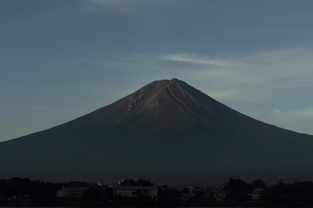 Usually Mount Fuji, pictured in 2019, has sprinkles of snow falling on its summit starting Oct. 2, about a month after the summertime hiking season there ends.