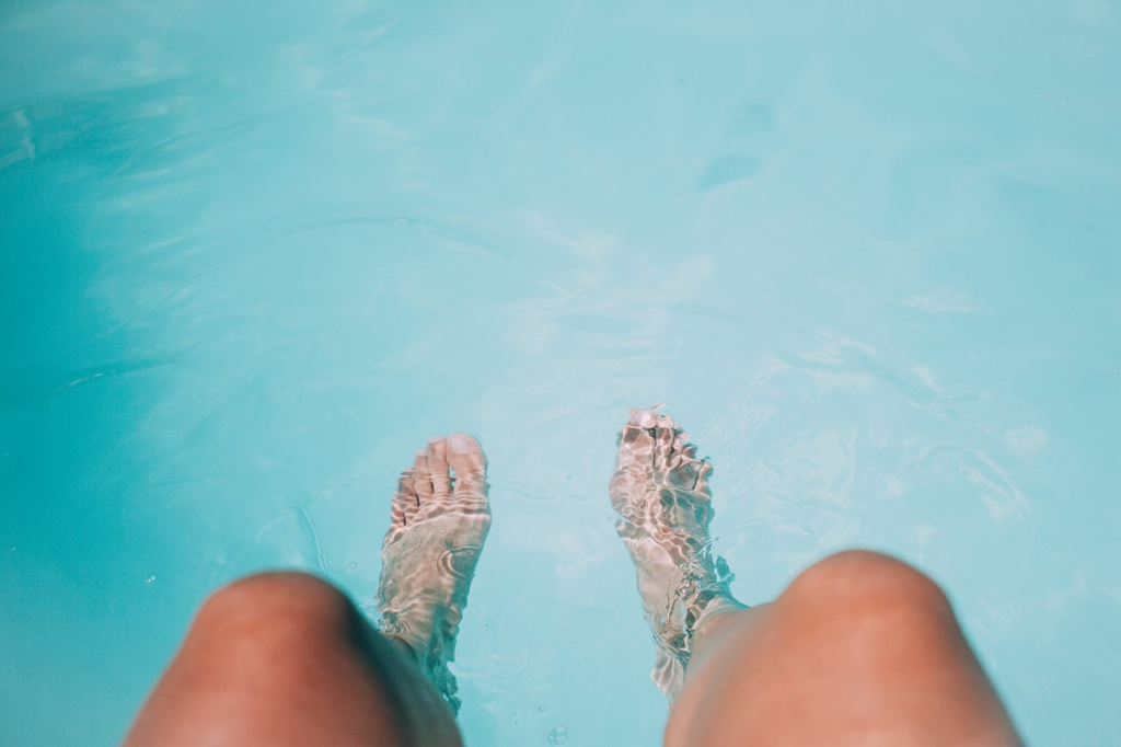 a person's feet in water