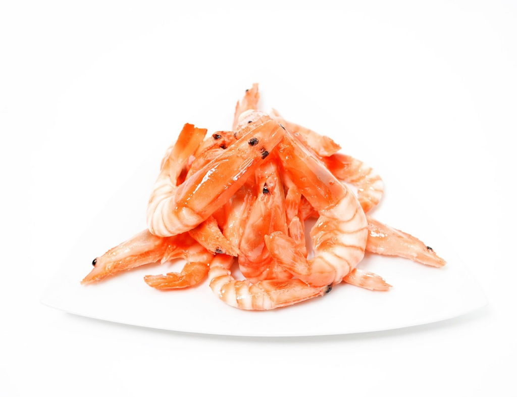 a small tower of shell-on shrimps