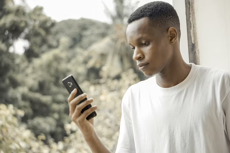a man checks his phone