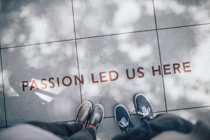 Letters on the ground spelling out "Passion led us here"