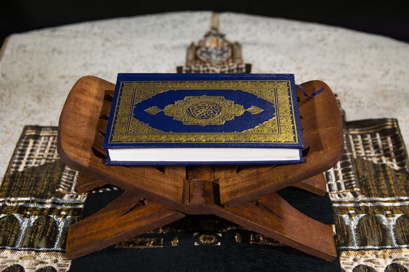 the Quran on a small book stand