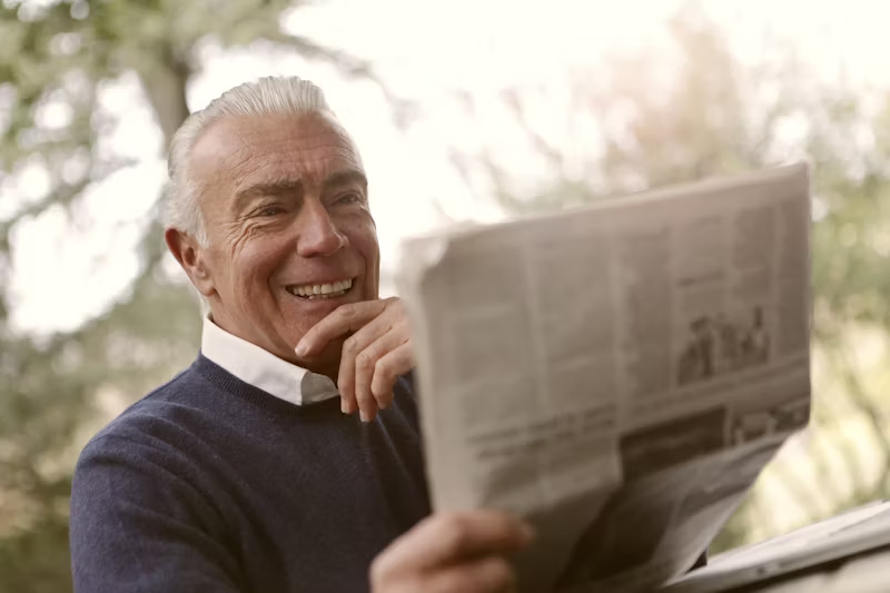 man reading the newspaper