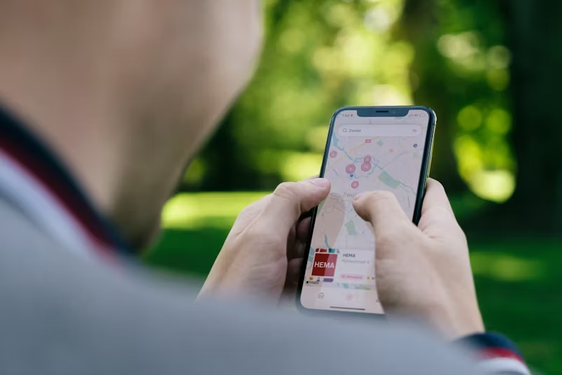 man using an iPhone