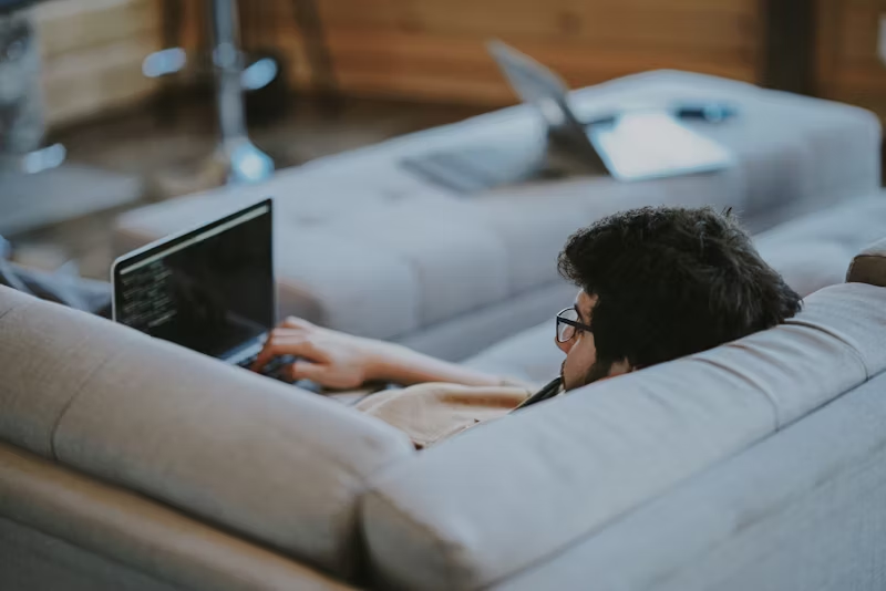 man lounging on a couch