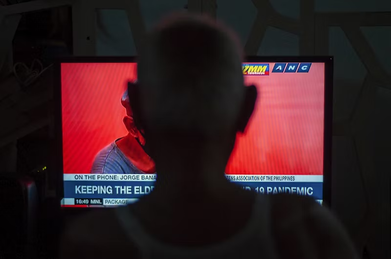person watching the news