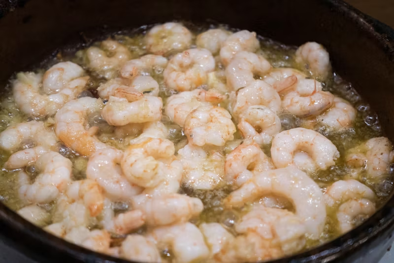 shrimp cooking in a pan