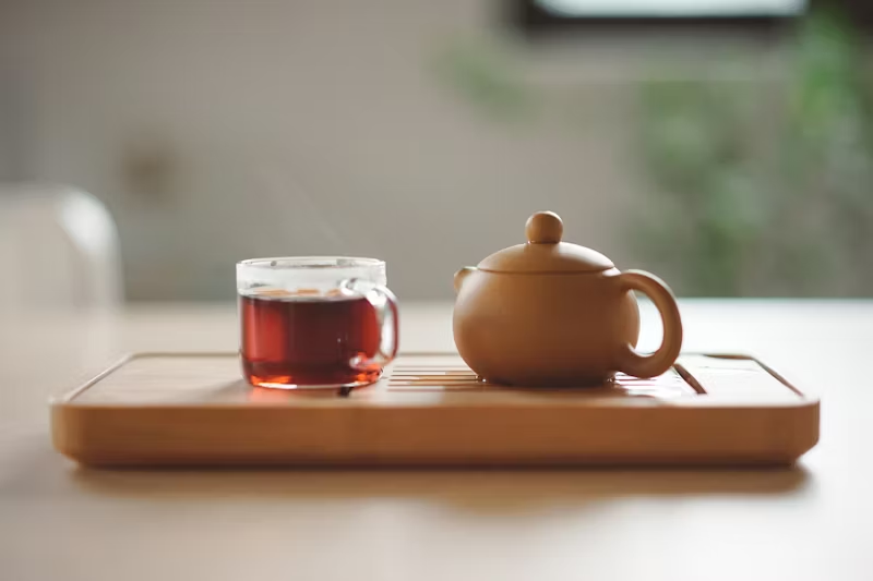 tea and small teapot on a platter