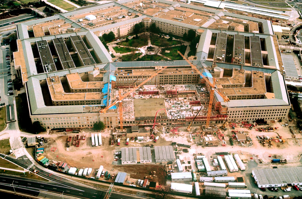 Reconstruction of the Pentagon continues nearly around the clock as work crews pour cement for floors and walls, Feb. 6, 2002, to replace those damaged in the 9/11 terrorist attack on the building.
