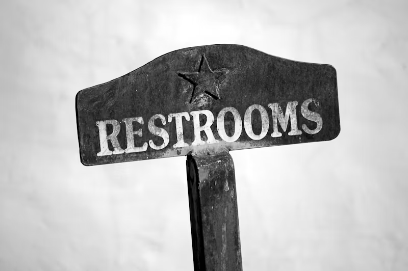'RESTROOMS' sign