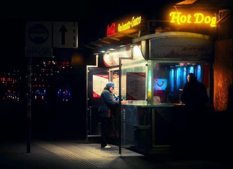 hot dog stand at night