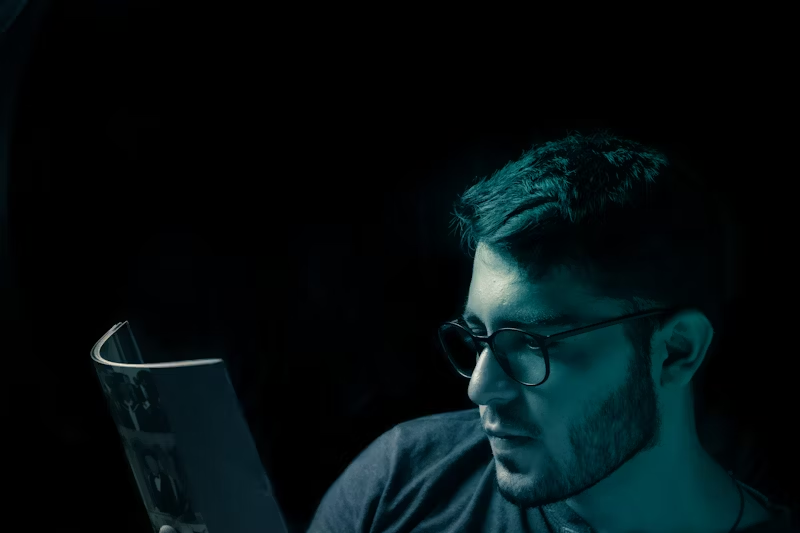 person reading a magazine