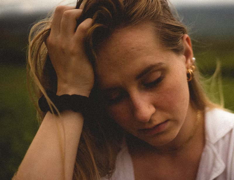 woman looking distressed