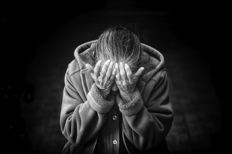 very sad old lady